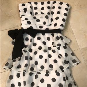 White with Black Polk a dot dress with ruffles